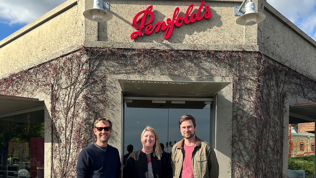 2 men and a woman standing in front of the entrance to the Penfolds cellar door and restaurant
